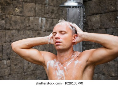 Man Washing Head In Shower