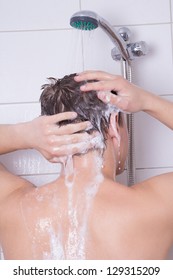 Man Washing His Hair In Shower