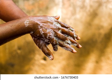 a man washing his hands by soap to maintain hygiene.stay healthy.avoid germ and virus.  