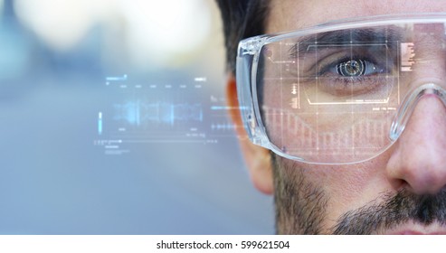 A Man Watches With A Futuristic Look With Glasses Augmented Reality In Holography. Concept: Immersive Technology, Future, Eyes, And Futuristic Vision.