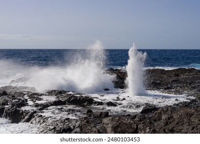 A man watching a blow hole at the coast - Powered by Shutterstock