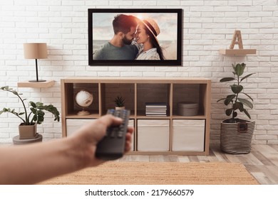 Man Watching Romantic Movie On TV At Home