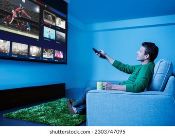 Man watching television in living room