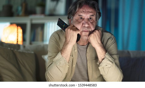 Man Watching Tv At Home