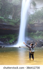 man and waterfall