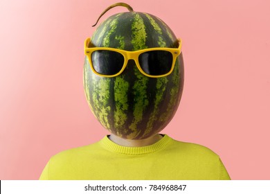 A man with a watermelon instead of head. Minimal concept.