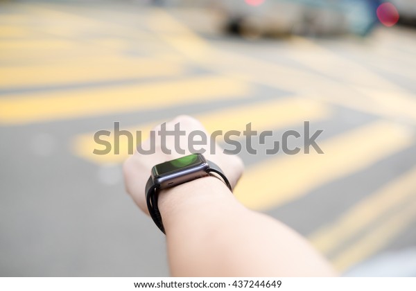 Man with wearable\
watch