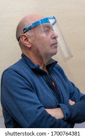 Man wearing a 3D printed visor to protect himself and others from the Covid-19