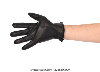Man wearing black leather glove on white background, closeup. Side view. High resolution photo. Full depth of field.