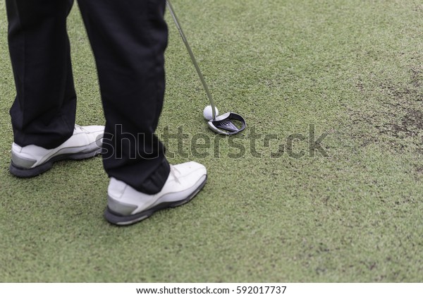 Man Wearing Black Pants White Golf 