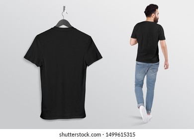 Man Wearing Black Plan T Shirt With Blue Denim Jeans Pant Hanging T Shirt Mockup