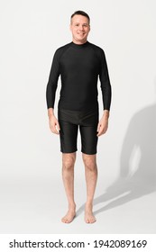 Man Wearing Black Rash Guard Mockup Psd And Swim Shorts