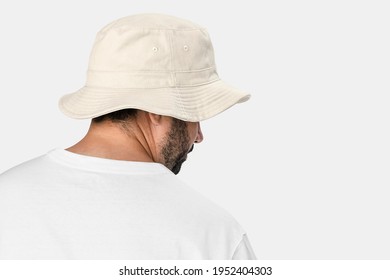 Man Wearing Bleached Bucket Hat, Rear View