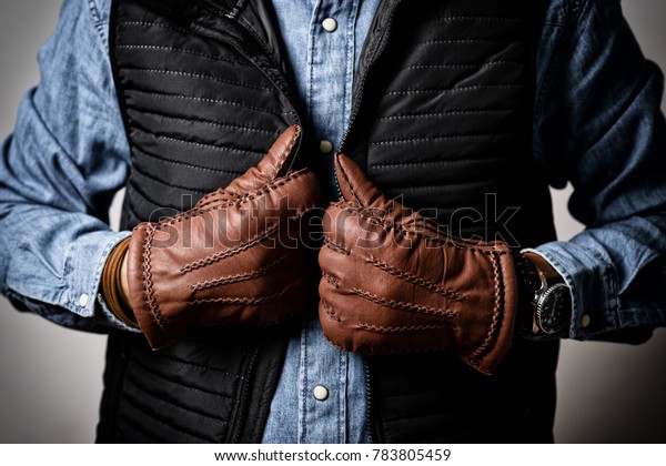 wearing leather gloves