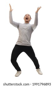 Man Wearing Casual Grey Shirt Black Denim And White Shoes, Excited Surprised Shocked And Happy Anticipating Something Amazing From Above. Full Body Portrait Isolated Cut Out