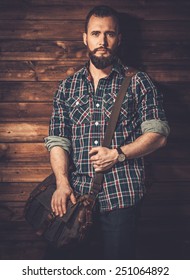 Man With Wearing Checkered  Shirt And Messenger Bag