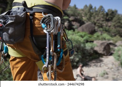 Man Wearing Climbing Harness