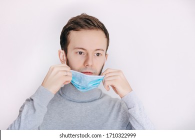 Hombre con mascarilla higiénica facial. Protección contra virus, ecología, contaminación del aire, concepto de sensibilización ambiental