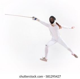 Man wearing fencing suit practicing with sword against gray - Powered by Shutterstock