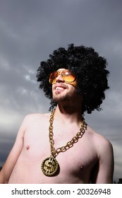 Man Wearing Funny Wig And Bling