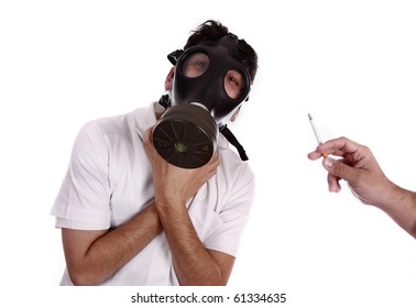 Man wearing a gas mask, trying to avoid pollution - healthy life concept