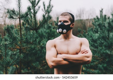 Man Wearing High Altitude Mask Fitness Training. 
