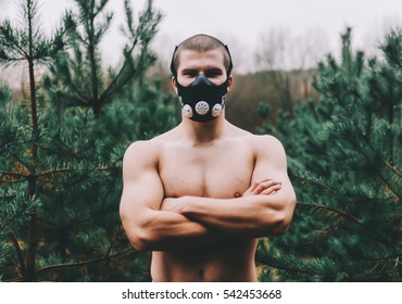 Man Wearing High Altitude Mask Fitness Training. 
