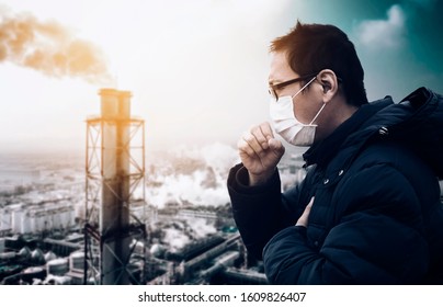 Man Wearing Mask Against Smog  And  Air Pollution Factory Background