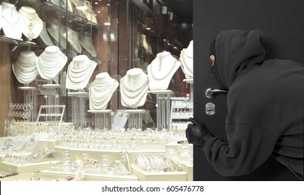 Man wearing a mask robbed a jewelry store. Robbery concept - Shutterstock ID 605476778
