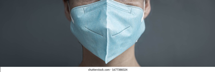 Man Wearing N 95 Surgical Mask. Corona Virus Protection. 