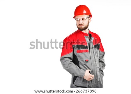 man wearing overalls with red helmet on white background