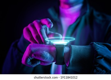 Man wearing a smartwatch wearable gadget - Powered by Shutterstock