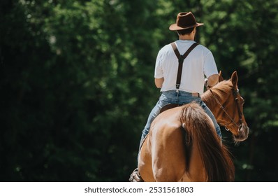 Man wearing suspenders and cowboy hat riding a horse outdoors in a rural setting with green trees in the background. - Powered by Shutterstock