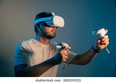 man wearing Virtual Reality   VR Headset. VR for gaming. Man play game in VR glasses. Hipster with virtual reality headset. - Powered by Shutterstock