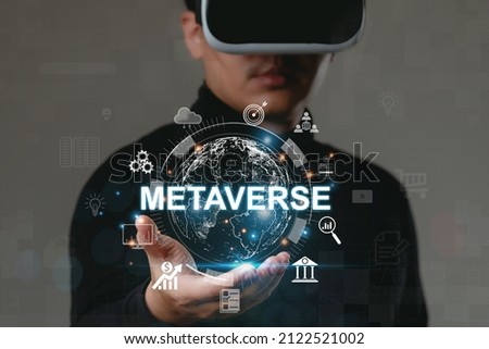 Man wearing VR glasses shows the future world of the metaverse, Global Business, Digital marketing, Metaverse, Digital link tech, future technology. Metaverse world virtual reality technology concept.