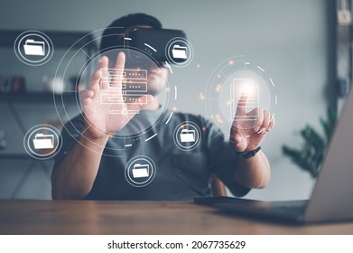 man wearing VR glasses virtual Global Internet connection metaverse, Document Management System, online documentation database and process automation to efficiently manage files, future technology. - Shutterstock ID 2067735629