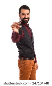 Man Wearing Waistcoat Holding Car Key 