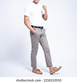 Man wearing white basic t shirt and grey chino pants catalogue
