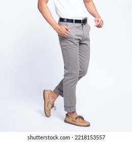 Man wearing white basic t shirt and grey chino pants catalogue
