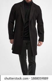 Man Wears Black Overcoat. Isolated Studio Shot Of Stylish Man In Dark Full Length Greatcoat