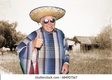 A Man Wears A Sombrero And A Serape While Posing In A Photo Booth Against A Green Screen Or Chroma Key Background  