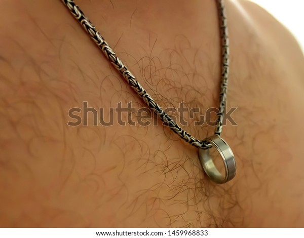 Man Wears Wedding Ring On Chain Stock 
