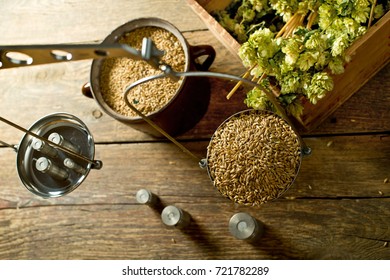 Man Weighs Malt For Home Brewing Of Beer.  Top View.