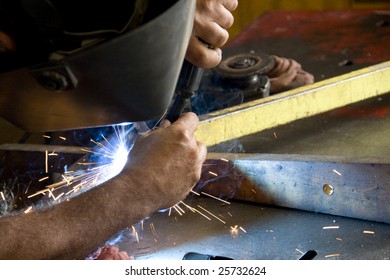 man welding