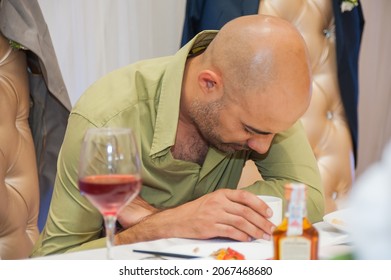 The Man Went Over With Alcohol And Fell Asleep At The Table