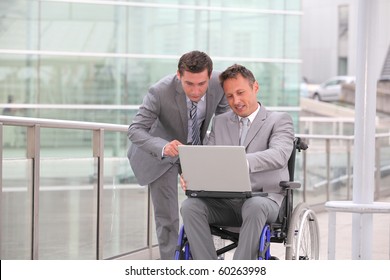 Man In Wheelchair In Business Travel