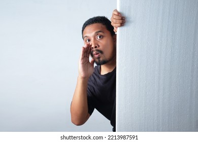 Man Whispering Behind The Wall