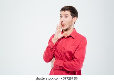 Man whispering gossip isolated on a white background
