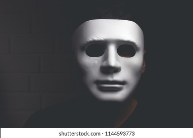 1,234 Man hiding behind mask Images, Stock Photos & Vectors | Shutterstock