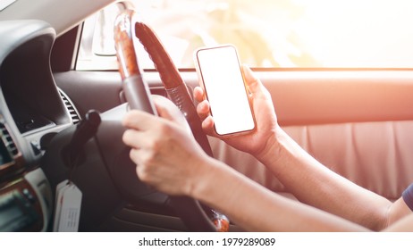 The Man Who Driving A Car Holding The Phone To Contact The Auto Repair Center Via A Smartphone App